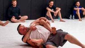 students learning grappling moves